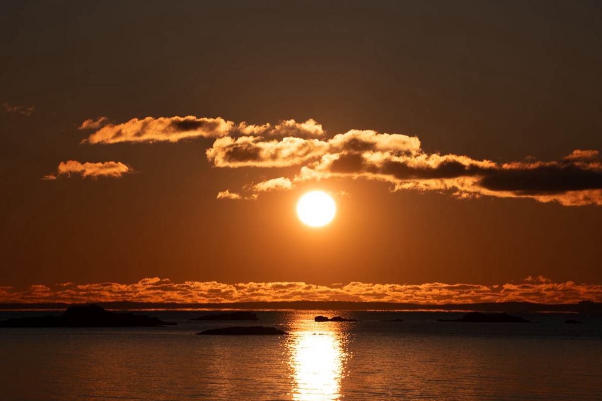 Sunrise over island shoreline