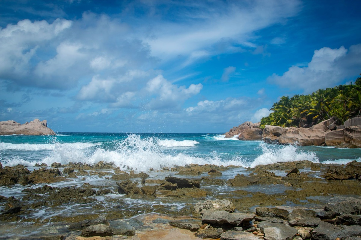 Seychelles resort private beach at sunset