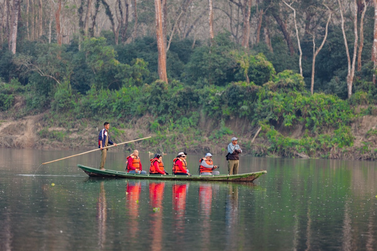 eco-tourist guide with co-codmeer in protected area